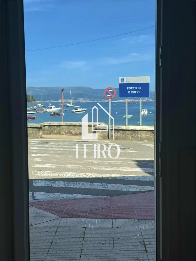 Vista exterior de Casa adosada en venda en A Illa de Arousa  amb Calefacció, Terrassa i Moblat