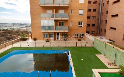 Swimming pool of Flat for sale in  Almería Capital  with Air Conditioner, Parquet flooring and Terrace