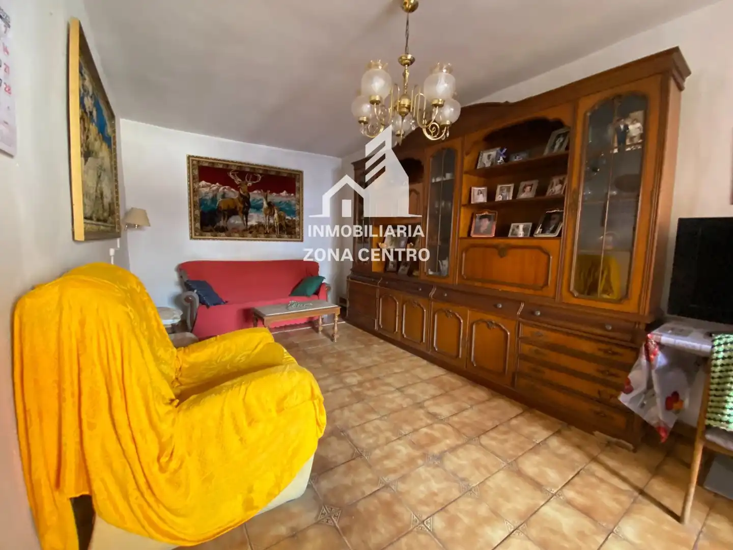 Sala de estar de Casa adosada en venta en Baltanás con Calefacción, Jardín privado y Amueblado