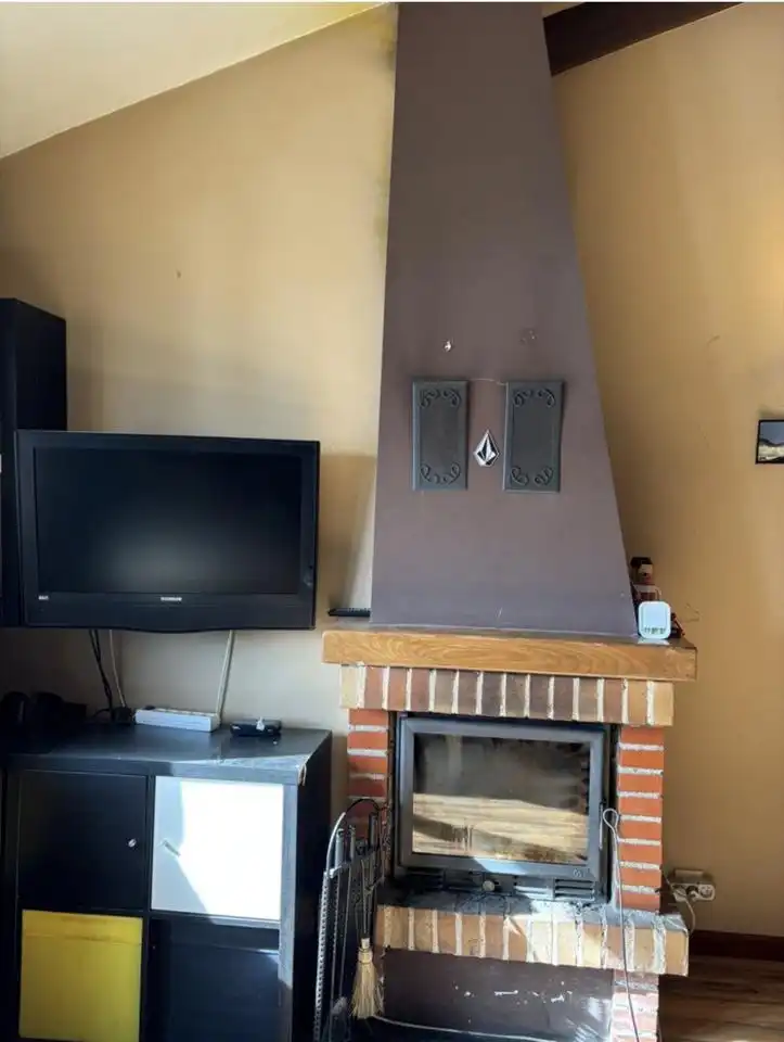 Sala de estar de Dúplex en venta en Puebla de Lillo con Calefacción, Trastero y Amueblado