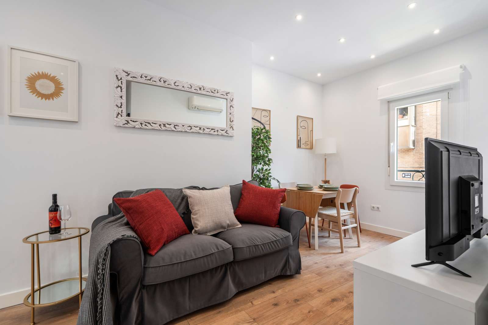 Sala d'estar de Apartament per a compartir en  Madrid Capital amb Aire condicionat, Terrassa i Moblat