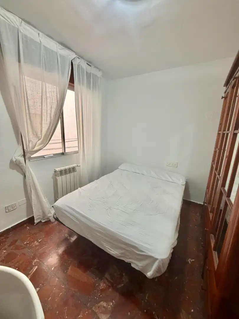 Bedroom of Flat for share in Jaén  with Air Conditioner, Heating and Furnished