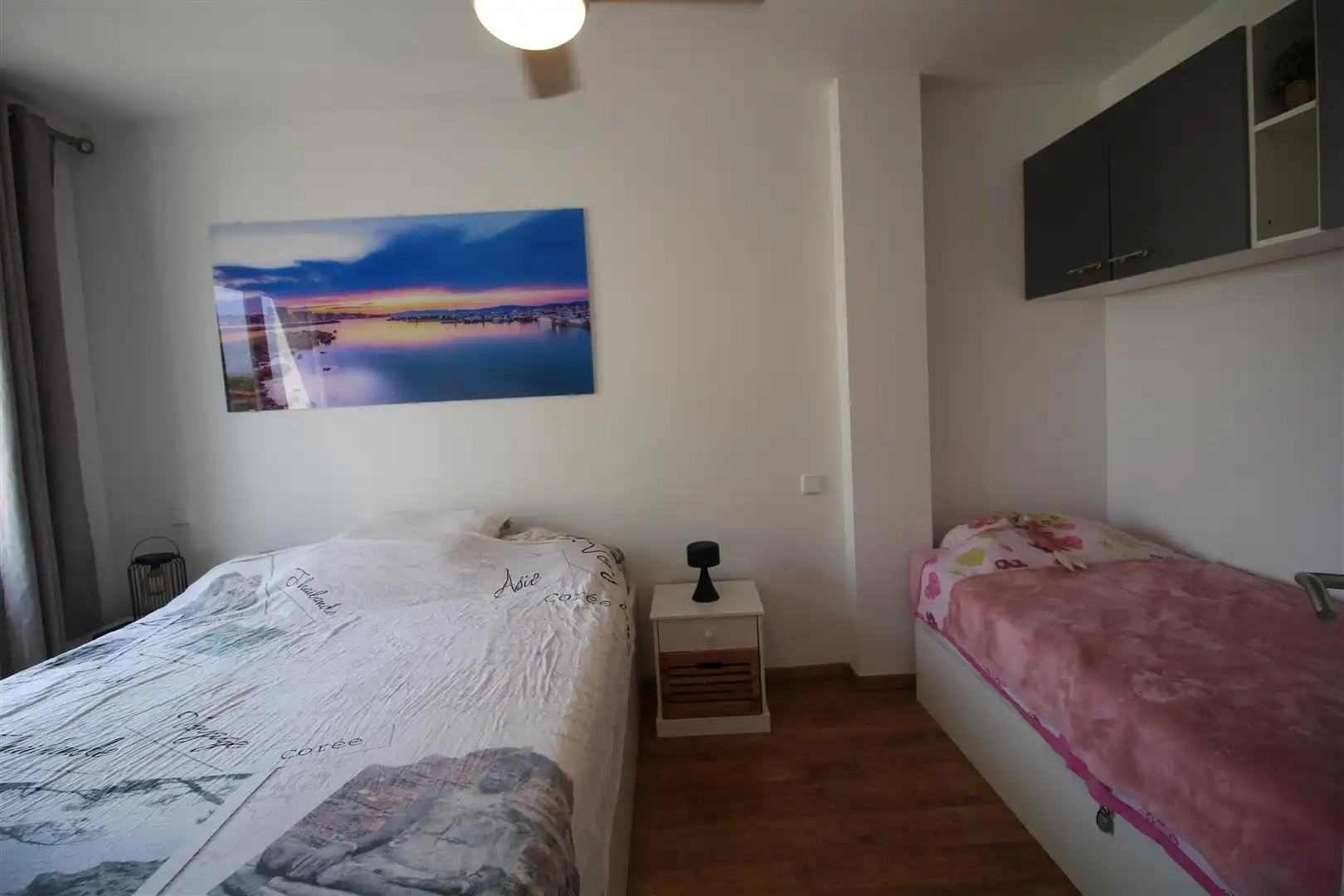 Dormitori de Apartament en venda en L'Escala amb Calefacció, Jardí privat i Parquet