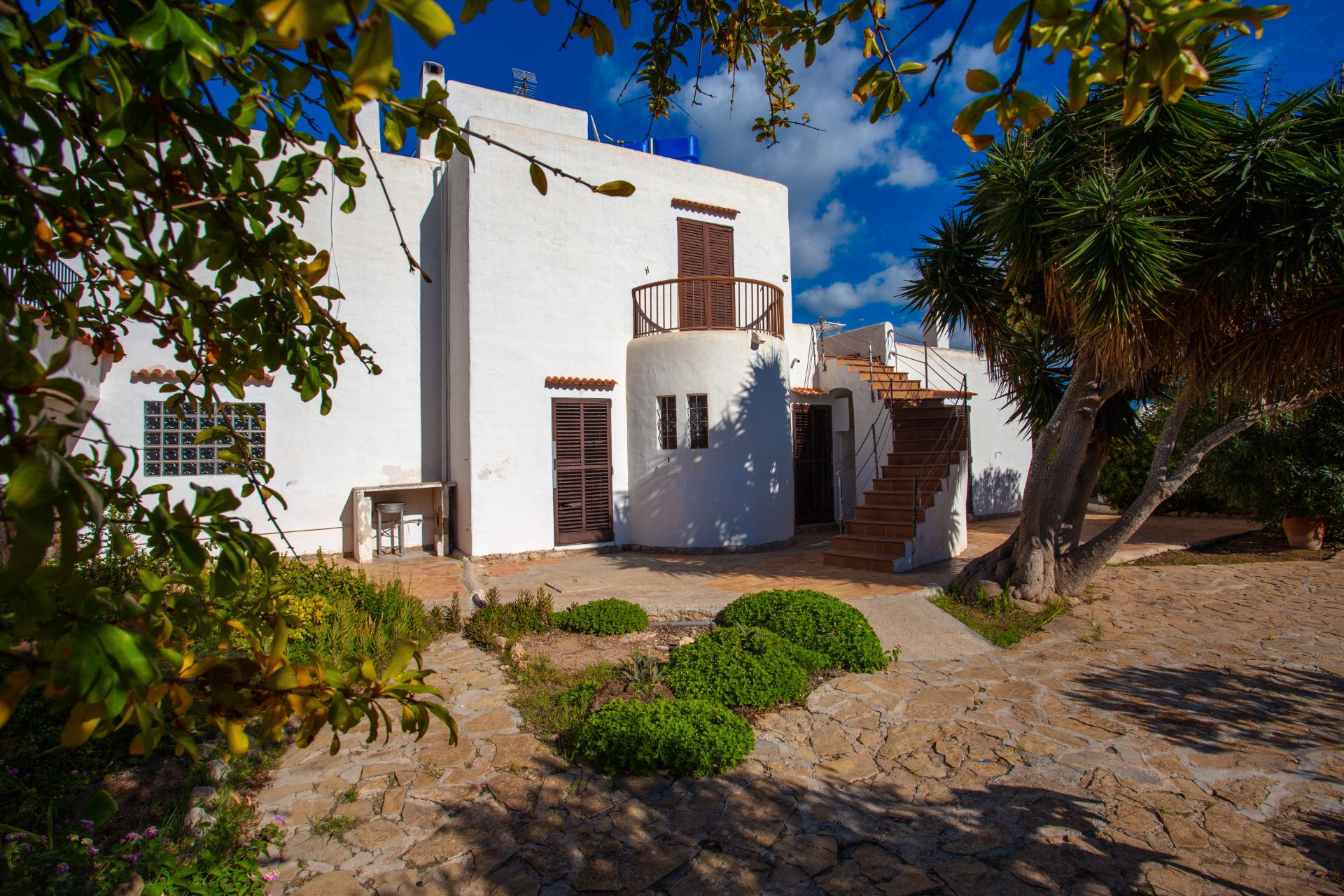 Vista exterior de Casa o xalet en venda en Sant Josep de sa Talaia amb Aire condicionat, Jardí privat i Terrassa