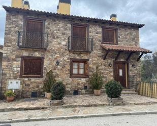 Vista exterior de Casa o xalet en venda en La Serna del Monte amb Calefacció, Jardí privat i Terrassa