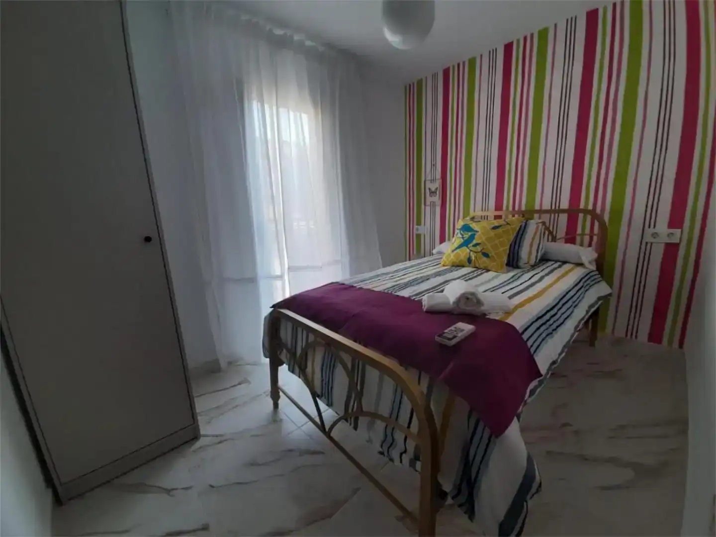 Dormitori de Casa adosada de lloguer en Martos amb Aire condicionat, Moblat i Rentadora