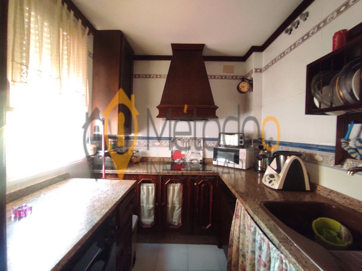 Kitchen of Flat for sale in Brenes  with Air Conditioner