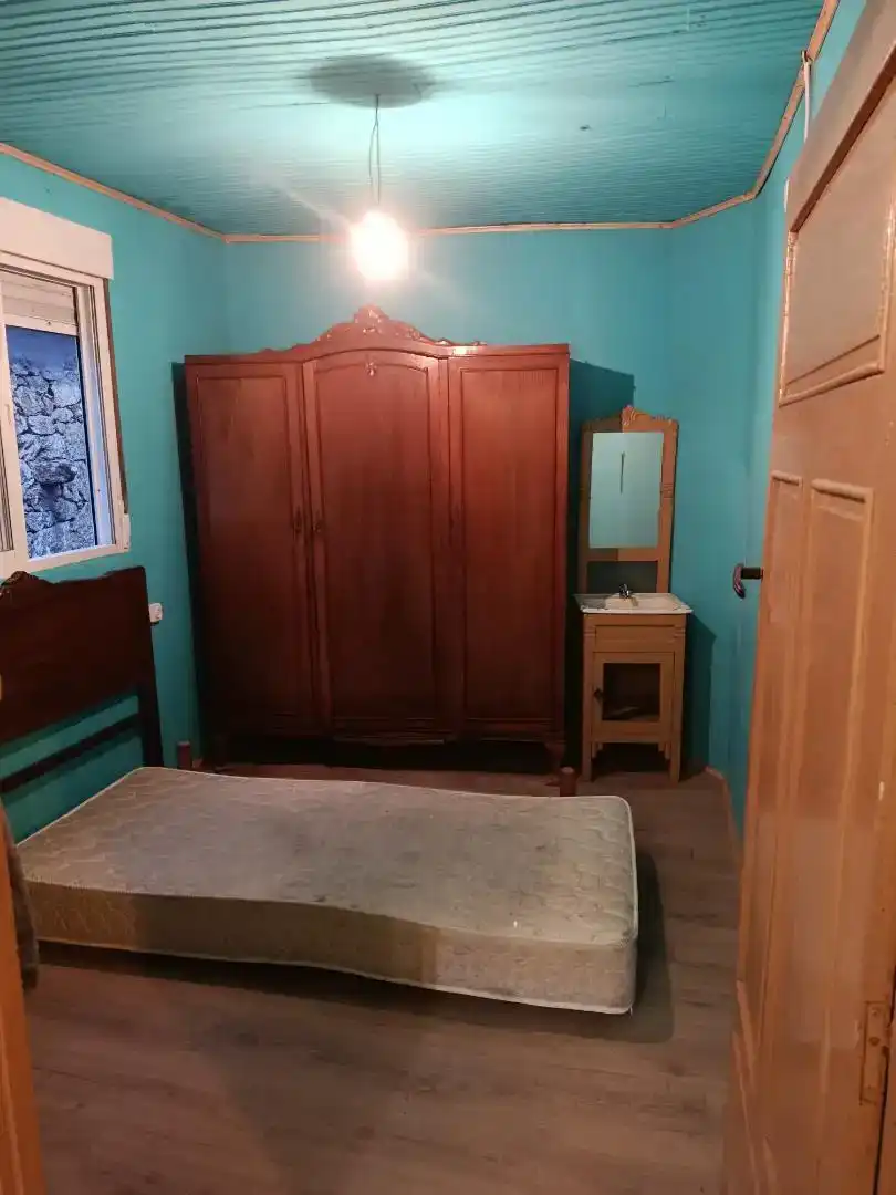 Schlafzimmer von Erdgeschoss zur Miete in Quintela de Leirado mit Parkett, Möbliert und Waschmaschine