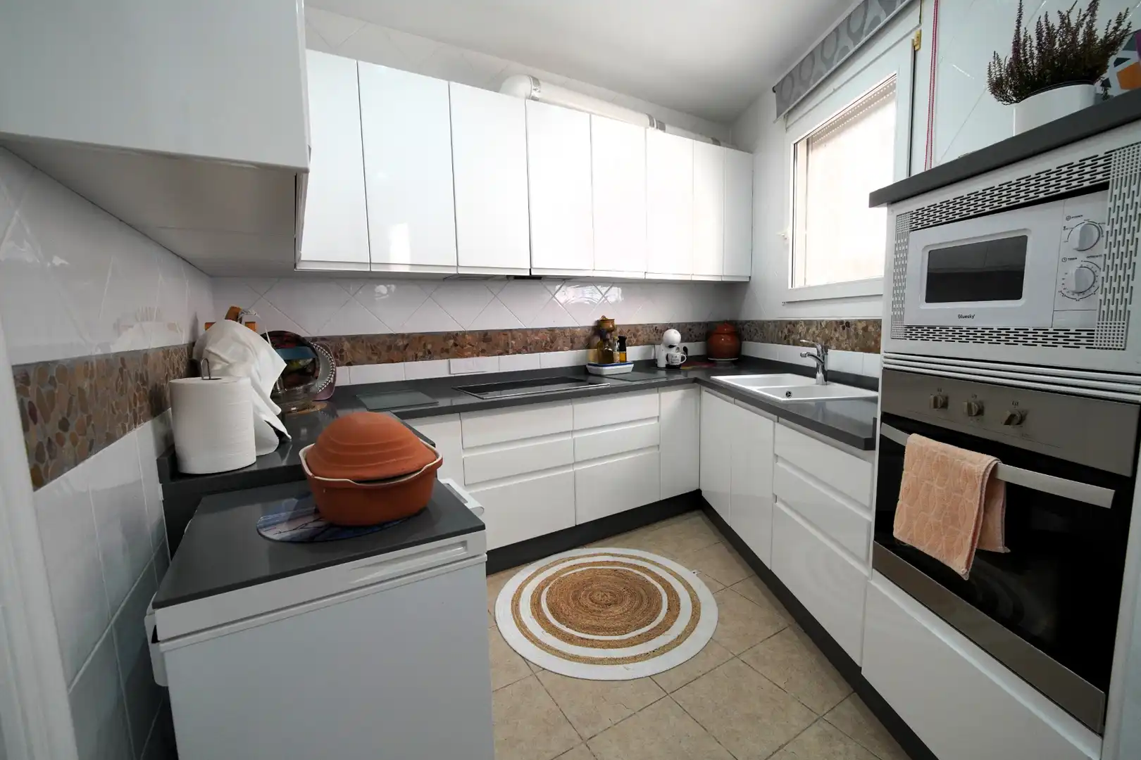 Cocina de Casa adosada en venta en Roquetas de Mar con Aire acondicionado, Jardín privado y Terraza
