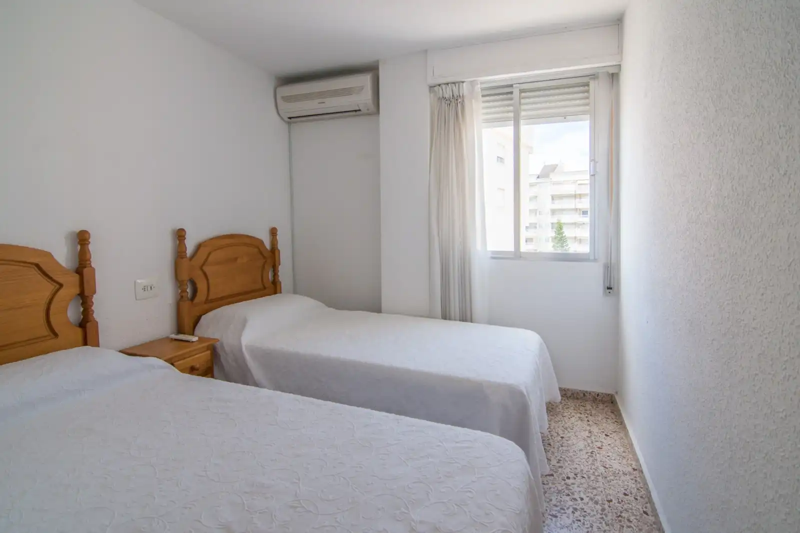 Dormitori de Apartament de lloguer en Gandia amb Aire condicionat, Terrassa i Moblat