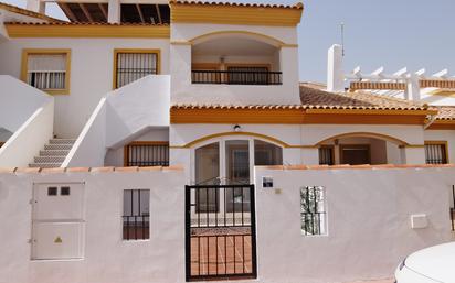 Vista exterior de Casa adosada en venda en Oliva amb Aire condicionat, Calefacció i Terrassa