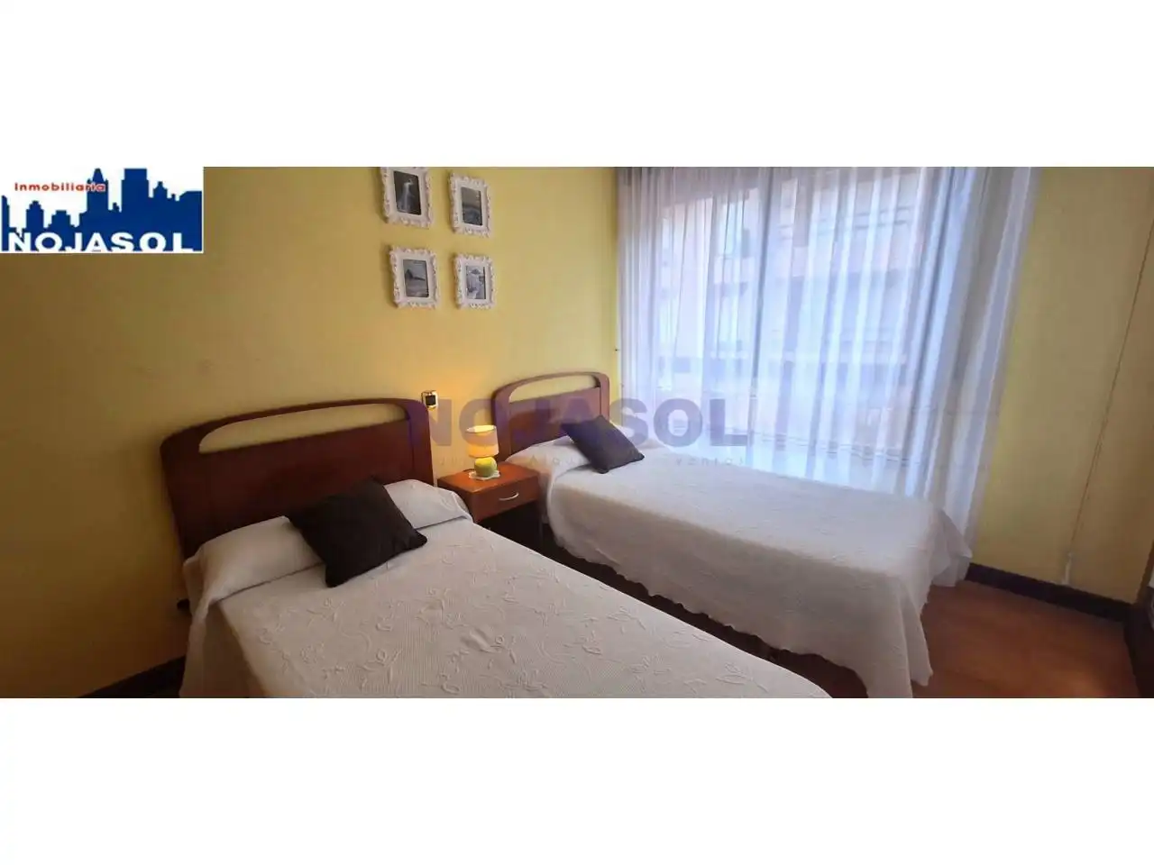 Dormitori de Apartament de lloguer en Noja amb Calefacció, Terrassa i Moblat