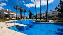 Swimming pool of Apartment for sale in Manilva  with Terrace and Community pool