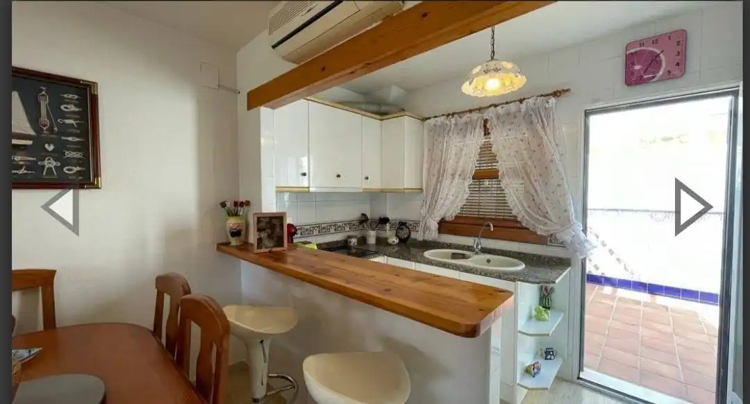 Cocina de Casa adosada en venta en Pilar de la Horadada con Aire acondicionado, Calefacción y Jardín privado