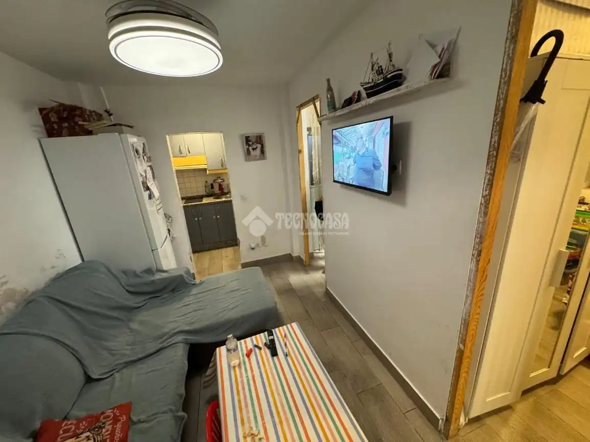 Sala d'estar de Casa adosada en venda en La Rinconada amb Aire condicionat i Calefacció