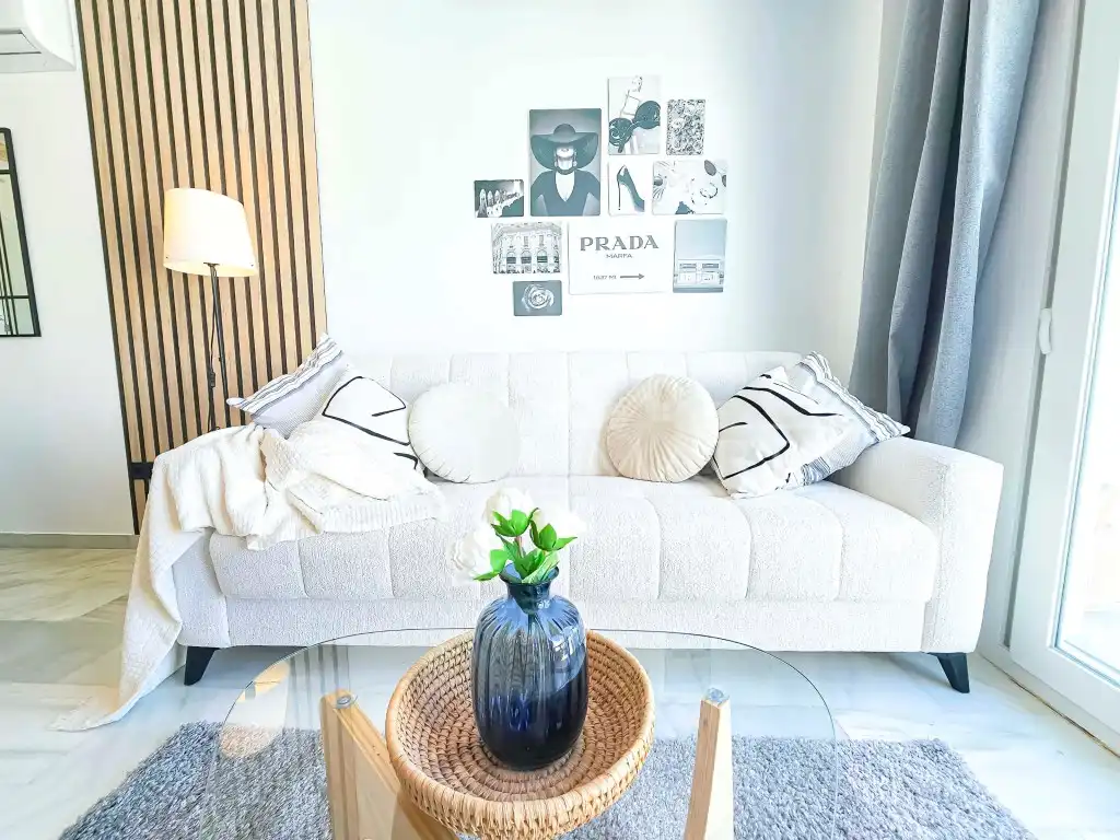Sala de estar de Casa adosada en venta en Nerja con Aire acondicionado, Terraza y Amueblado