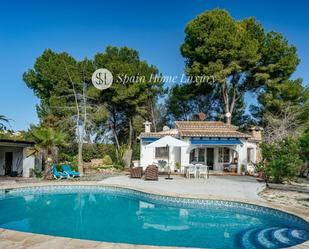 Vista exterior de Casa o xalet en venda en Moraira amb Aire condicionat, Terrassa i Traster