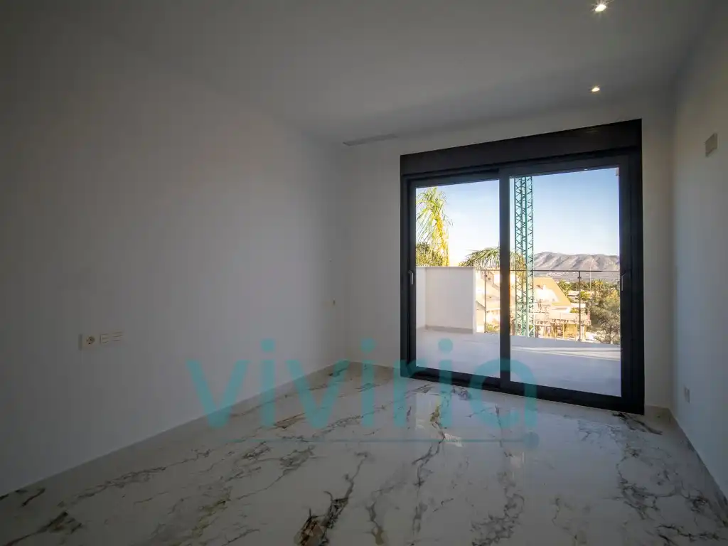Dormitori de Casa o xalet en venda en La Nucia amb Jardí privat