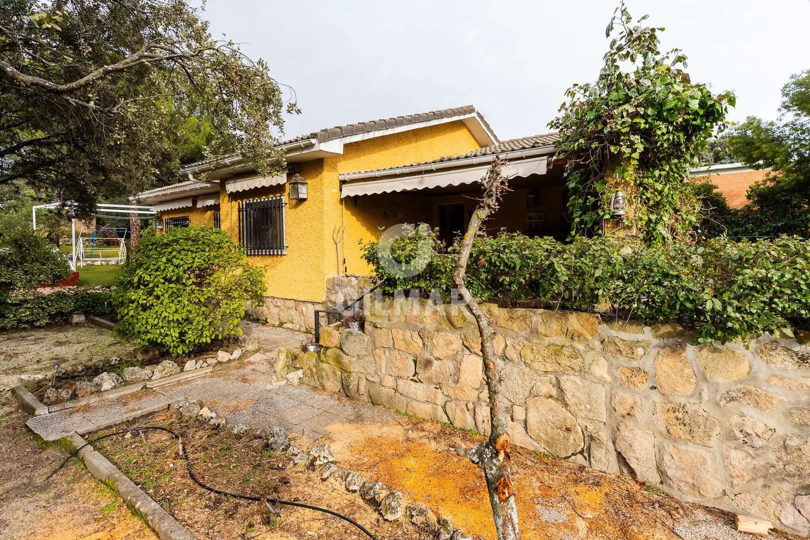 Vista exterior de Casa o chalet en venta en Hoyo de Manzanares con Calefacción, Jardín privado y Piscina