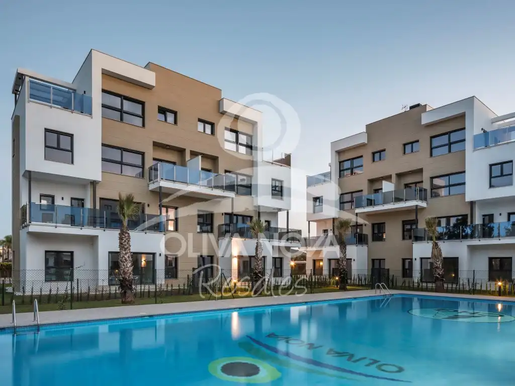 Außenansicht von Wohnungen zum Verkauf in Oliva mit Klimaanlage, Privatgarten und Schwimmbad
