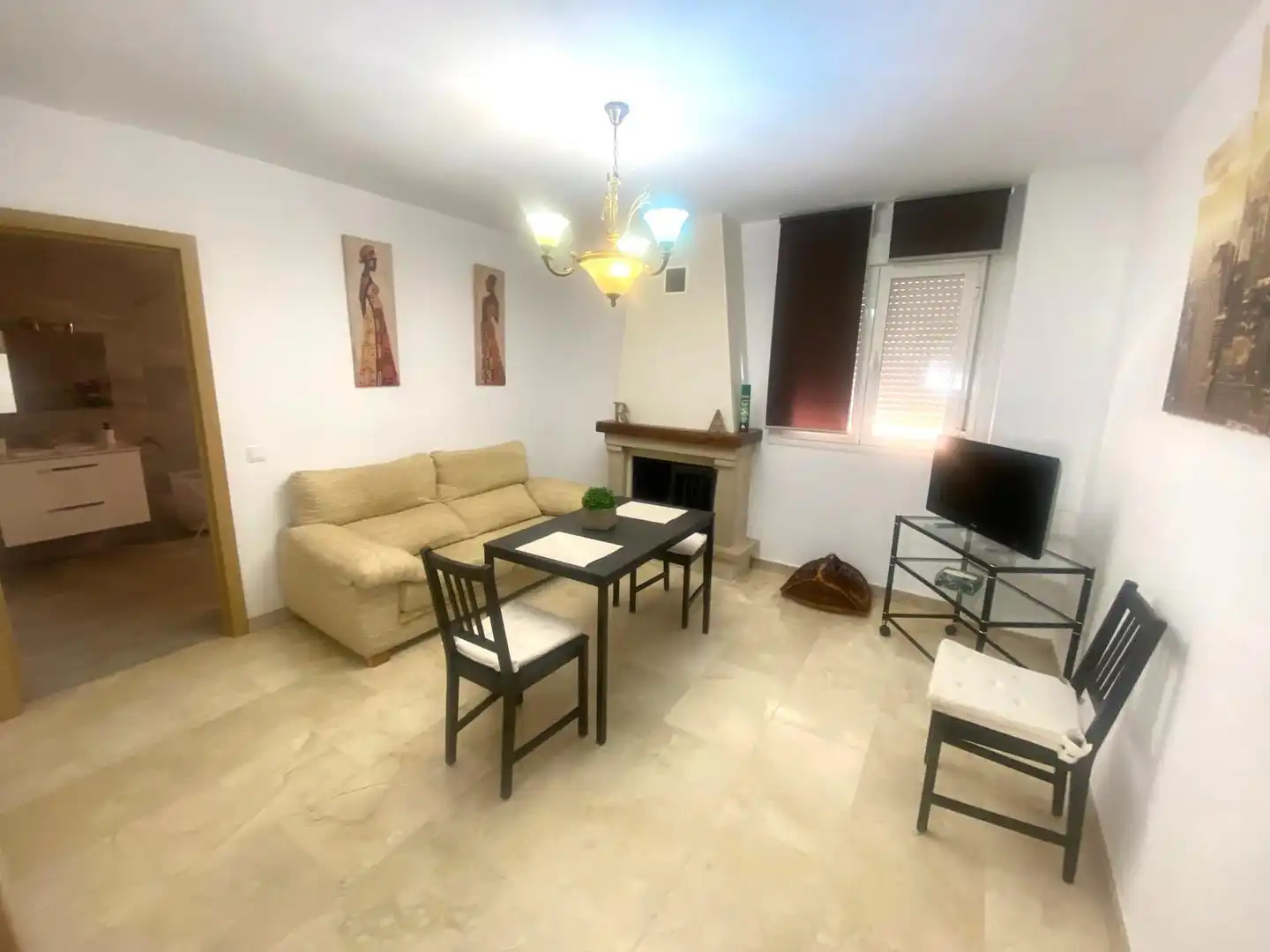 Sala d'estar de Casa o xalet en venda en Málaga amb Terrassa i Moblat