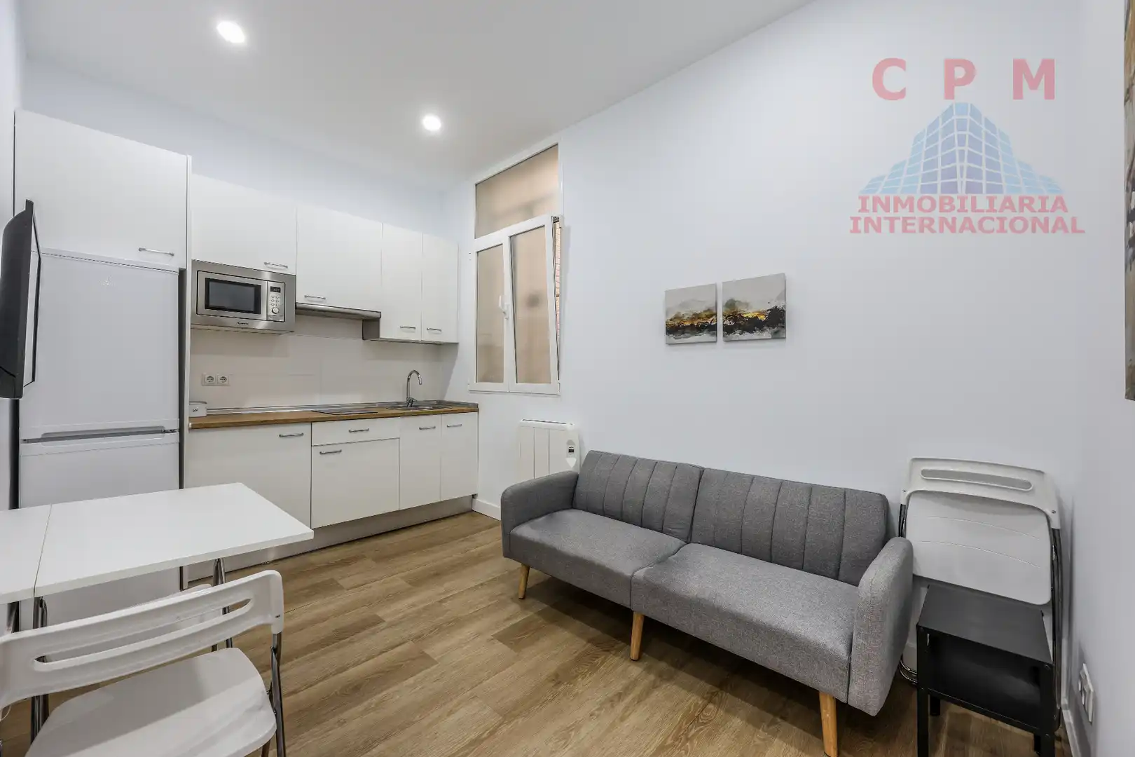 Sala d'estar de Pis de lloguer en  Madrid Capital amb Calefacció, Parquet i Moblat