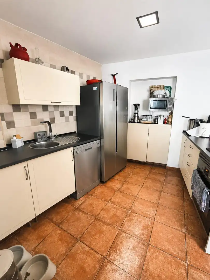 Cuina de Casa adosada en venda en Gines amb Terrassa