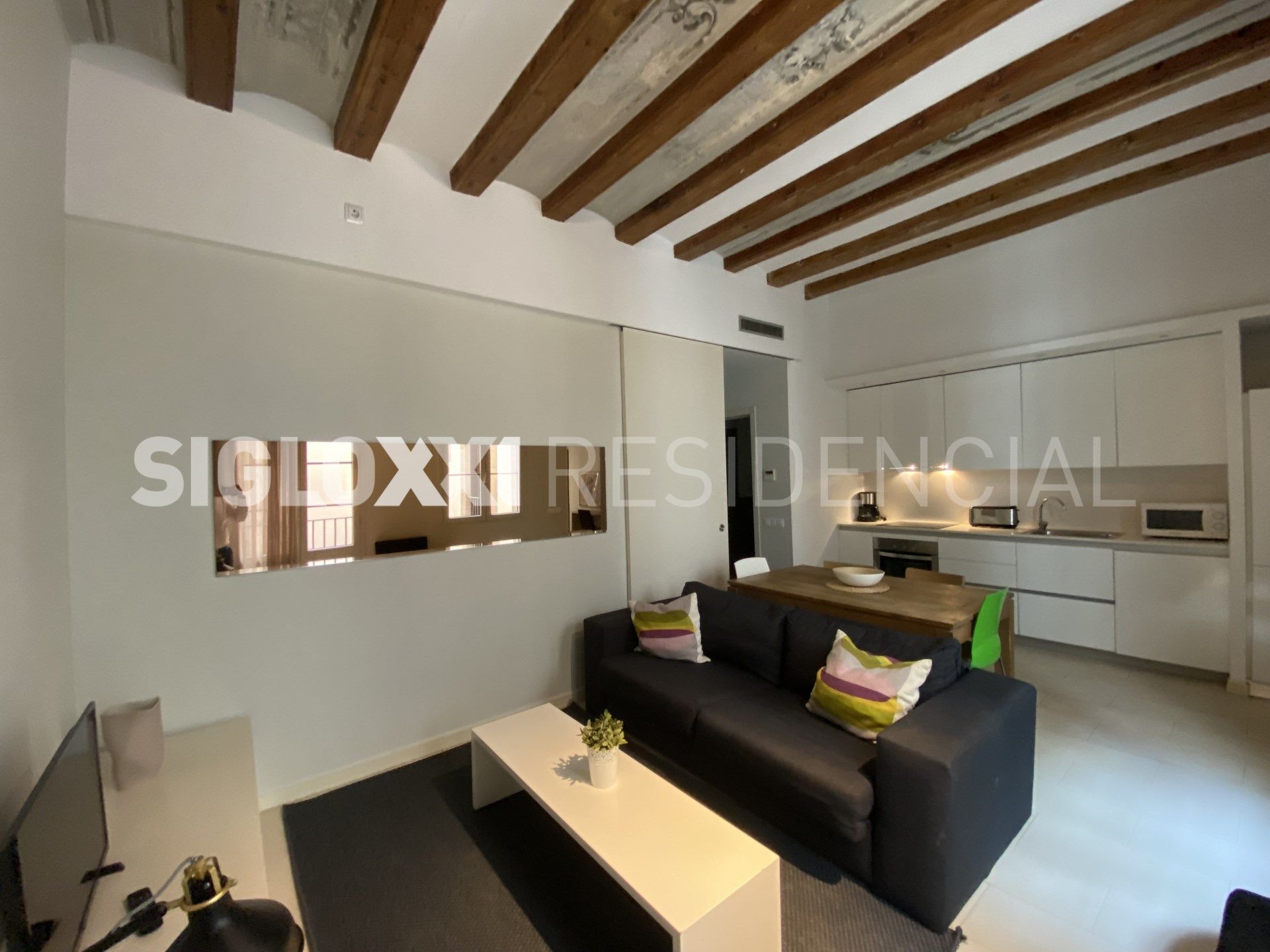 Sala de estar de Piso de alquiler en  Barcelona Capital con Aire acondicionado, Calefacción y Amueblado