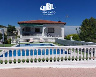 Exterior view of House or chalet for sale in Fuerte del Rey  with Air Conditioner, Terrace and Swimming Pool