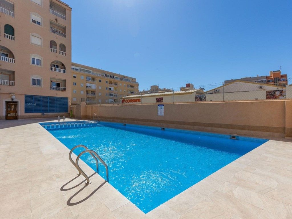 Swimming pool of Attic for sale in Torrevieja  with Air Conditioner, Furnished and Community pool