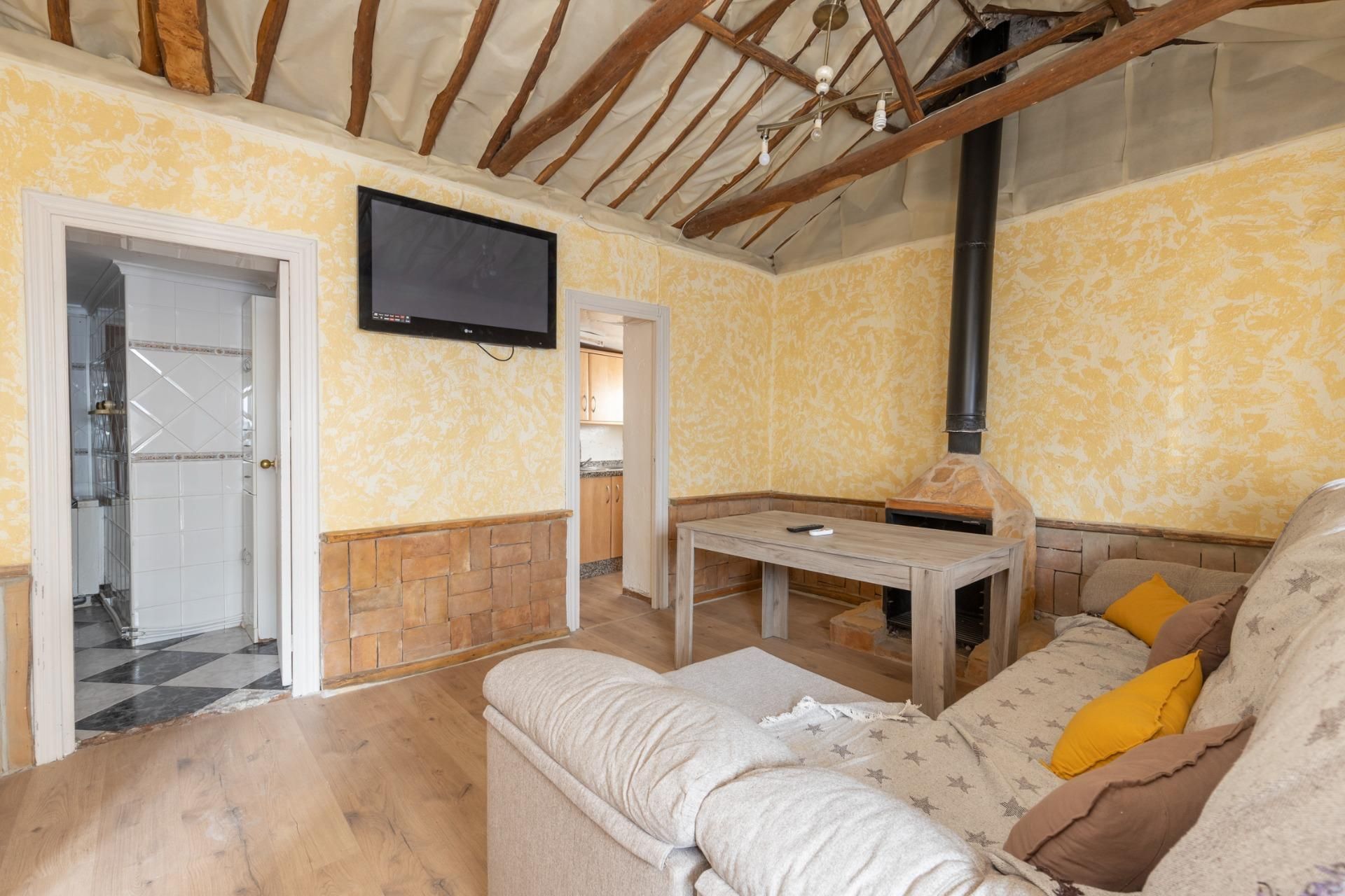 Sala d'estar de Casa adosada en venda en Moclín