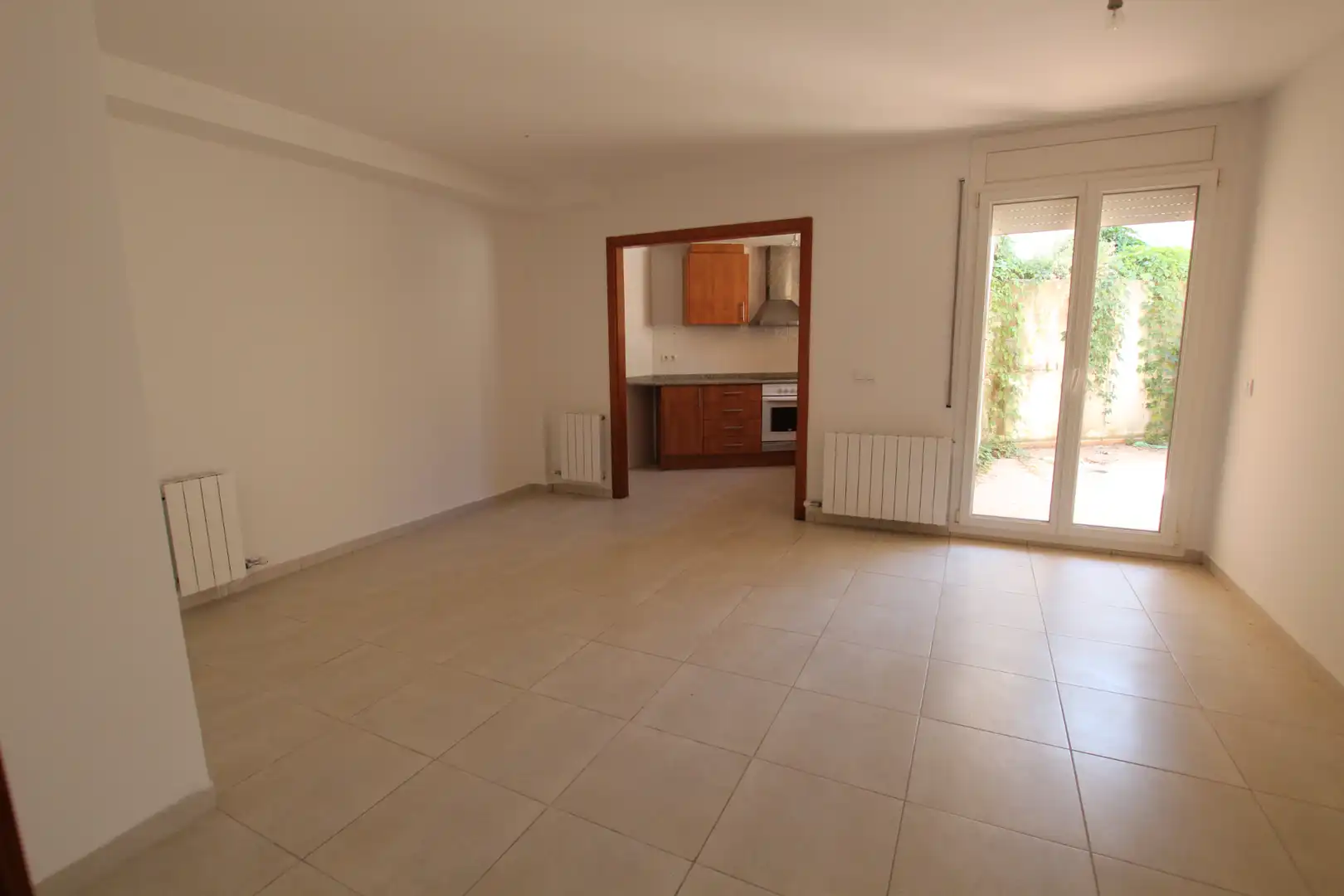 Sala de estar de Piso en venta en Sant Julià de Ramis con Calefacción, Terraza y Horno