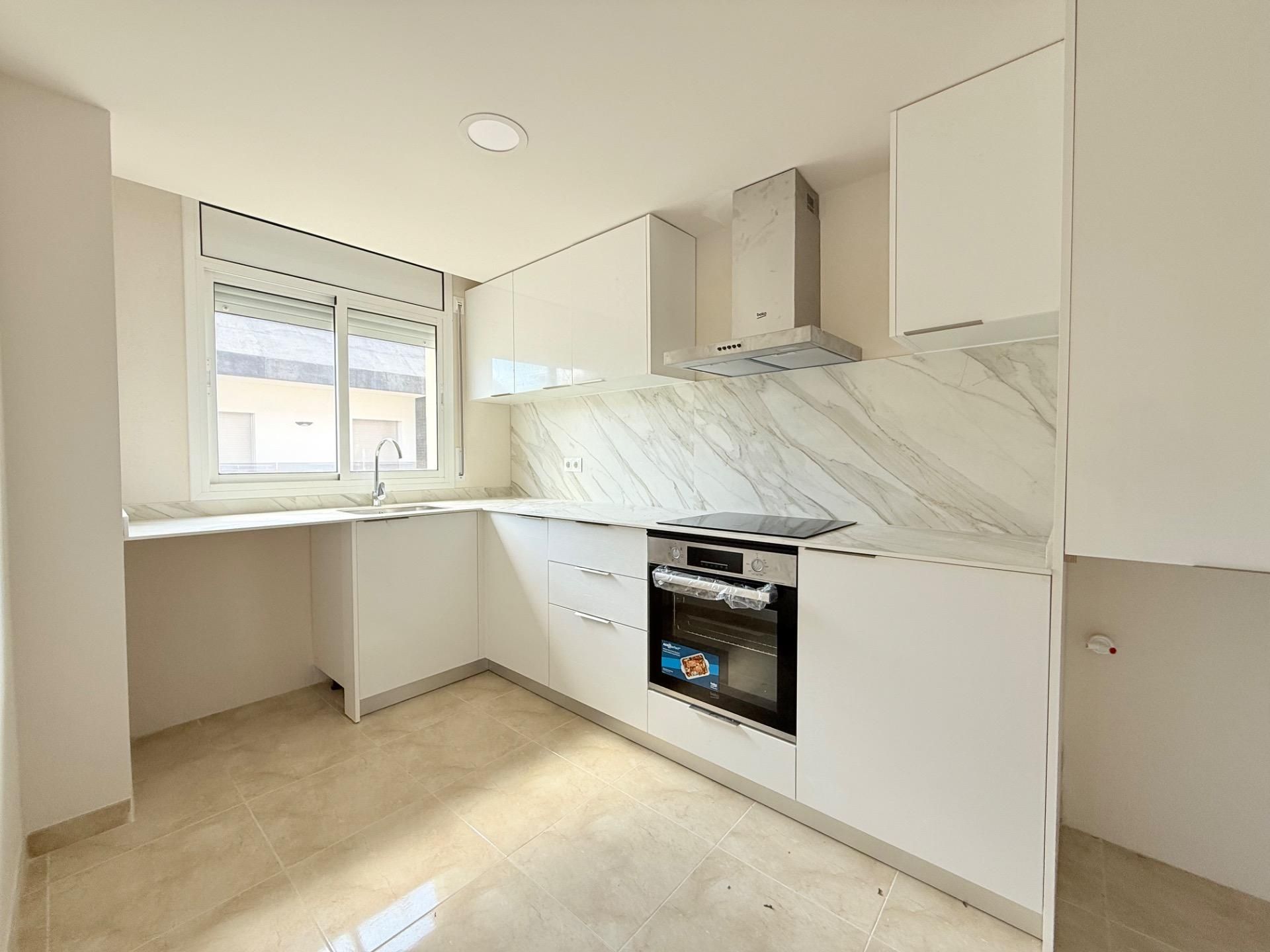 Kitchen of Flat for sale in L'Aldea  with Air Conditioner