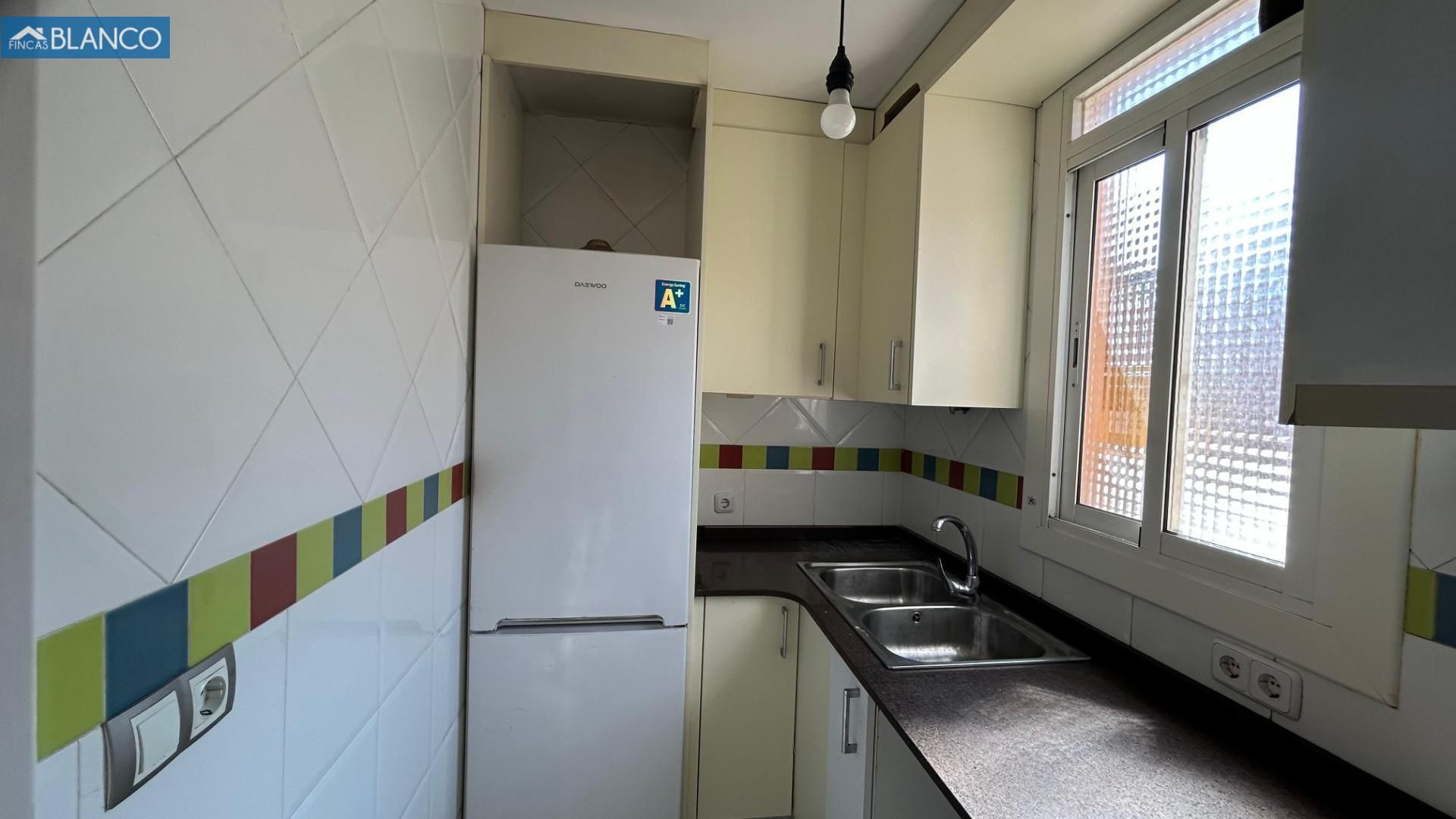 Kitchen of Flat for sale in L'Hospitalet de Llobregat  with Balcony and Alarm