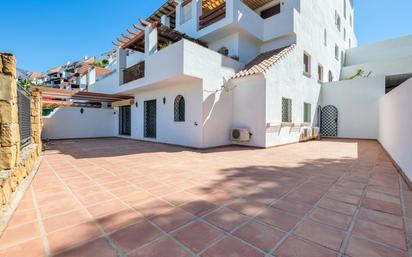 Exterior view of Planta baja for sale in Marbella  with Air Conditioner, Terrace and Swimming Pool