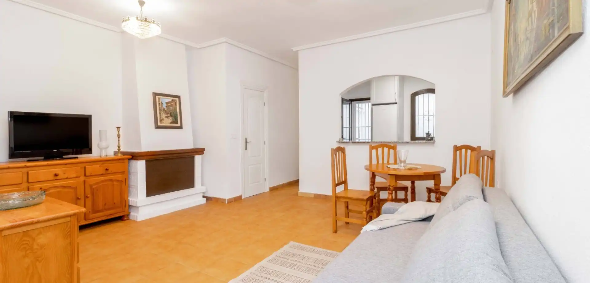 Sala d'estar de Casa o xalet en venda en Orihuela amb Aire condicionat, Terrassa i Moblat
