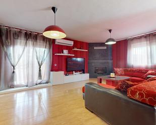 Sala d'estar de Casa adosada en venda en Alguazas amb Aire condicionat i Terrassa