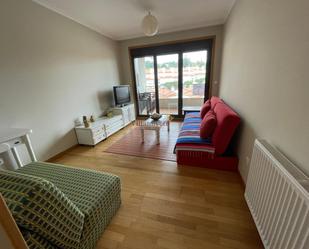 Sala d'estar de Apartament en venda en Sanxenxo amb Calefacció, Terrassa i Traster