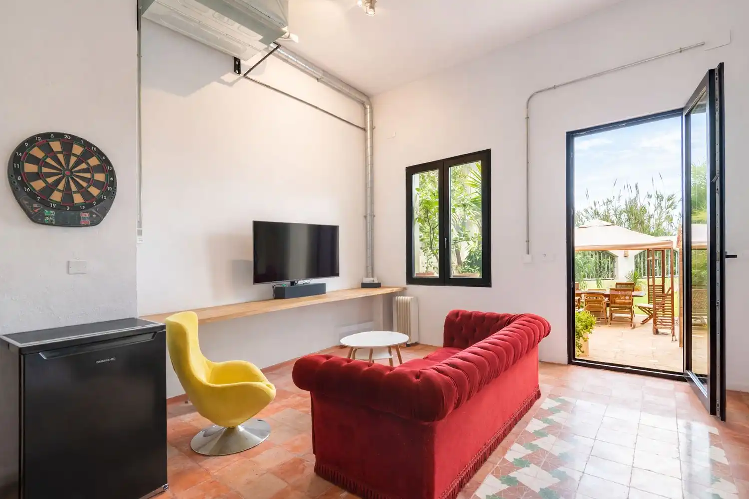 Sala d'estar de Casa adosada en venda en Alicante / Alacant amb Aire condicionat, Jardí privat i Terrassa