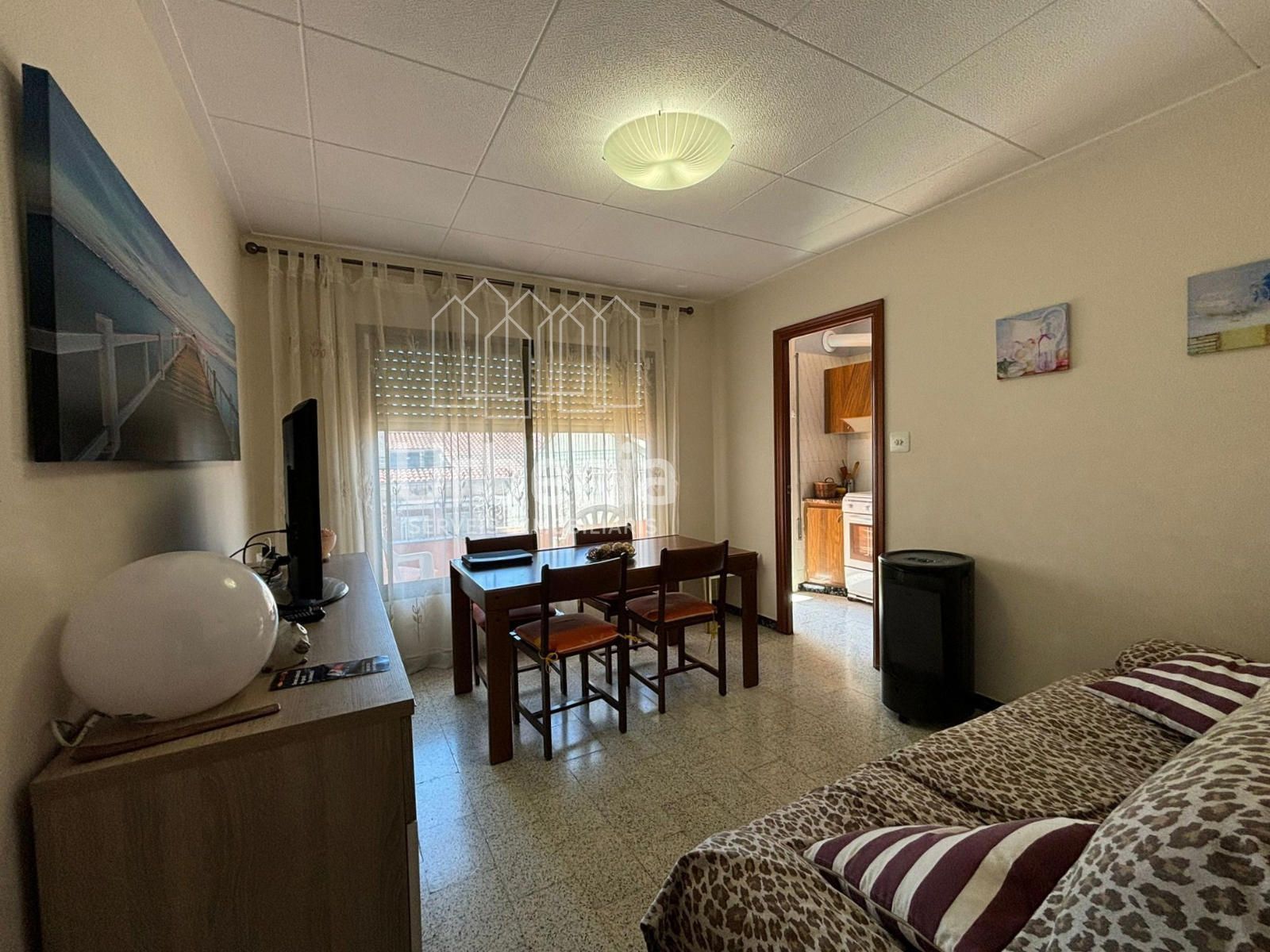 Sala de estar de Piso en venta en Calella con Calefacción, Terraza y Amueblado