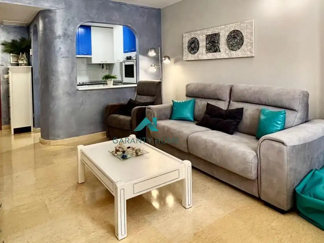 Sala de estar de Apartamento en venta en La Manga del Mar Menor con Aire acondicionado, Jardín privado y Terraza