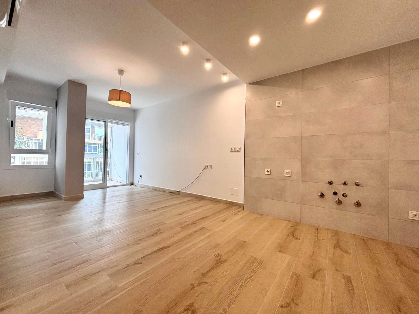 Sala d'estar de Apartament en venda en Benalmádena amb Aire condicionat i Terrassa