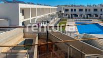 Vista exterior de Casa adosada en venda en El Puig de Santa Maria amb Jardí privat, Terrassa i Piscina