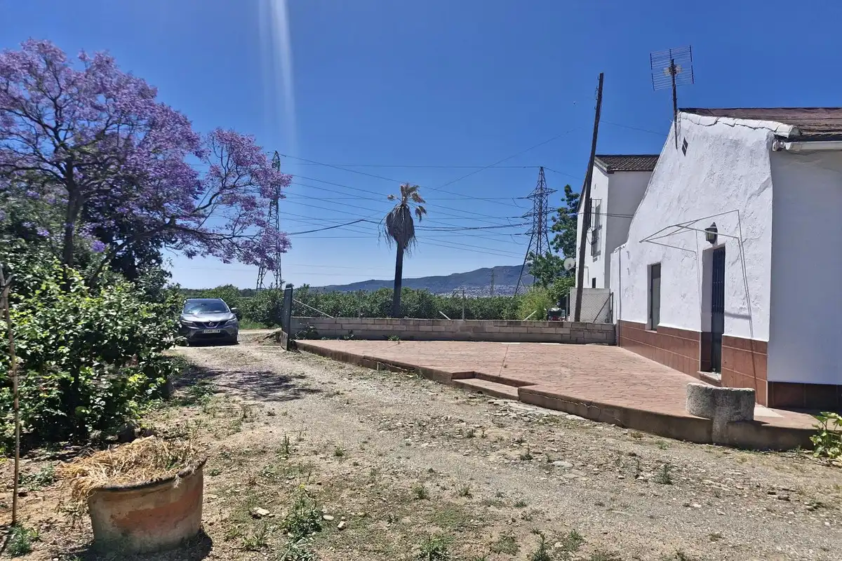 Vista exterior de Finca rústica en venda en Málaga amb Jardí privat, Terrassa i Traster