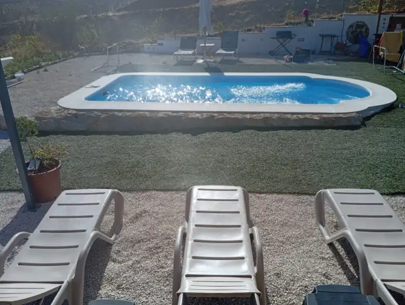 Piscina de Finca rústica de alquiler en Lucena con Aire acondicionado, Lavadora y Microondas