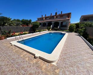 Swimming pool of Single-family semi-detached for sale in Roda de Berà  with Air Conditioner, Heating and Terrace