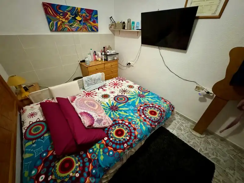 Schlafzimmer von Erdgeschoss zum Verkauf in Cullera mit Klimaanlage, Heizung und Privatgarten