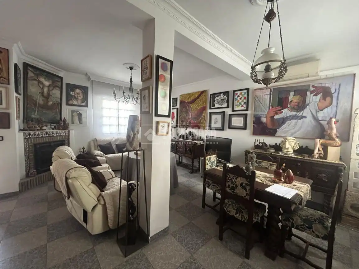 Sala de estar de Casa adosada en venta en Huelva con Aire acondicionado