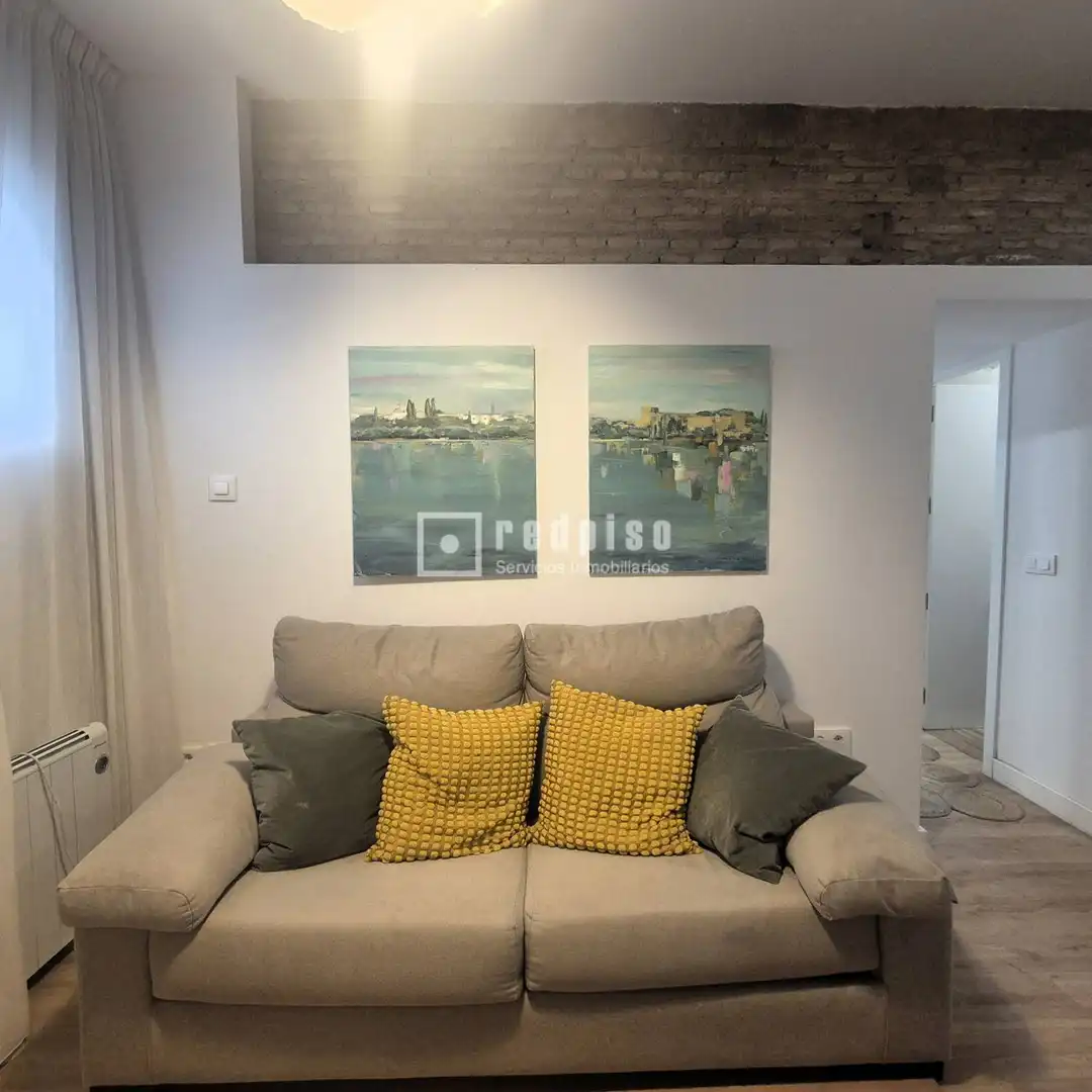 Sala d'estar de Apartament en venda en Sevilla amb Aire condicionat, Moblat i Alarma
