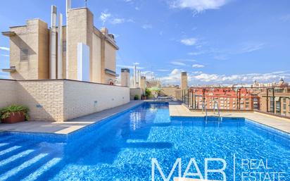 Swimming pool of Duplex for sale in  Madrid Capital  with Air Conditioner and Balcony